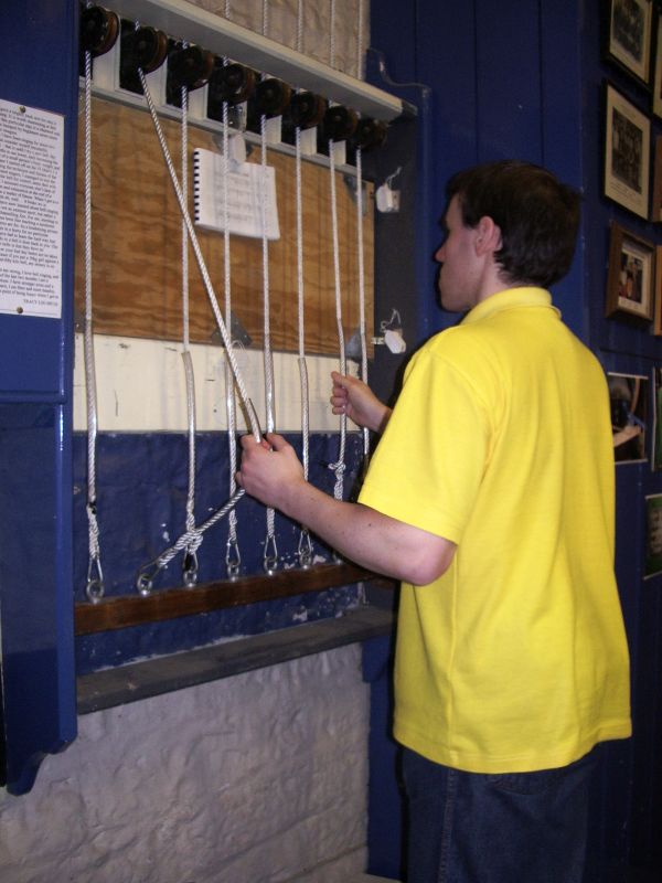 Ellacombe chiming manual in use by the photographer in the Ringing Room at St John the Baptist&comma; Keynsham&period;