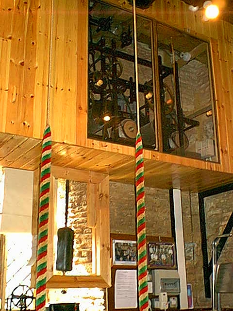 The new clock case in the Ringing Room at St James, Mangotsfield mounted on steel beams and brackets.